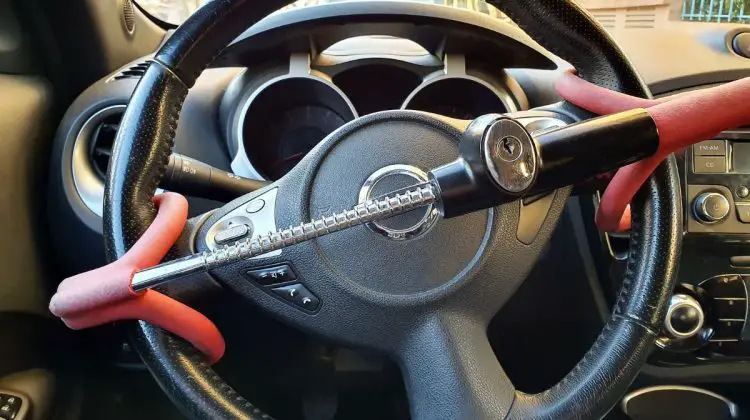 What causes a steering wheel to lock up while parked-Low Fluid Level