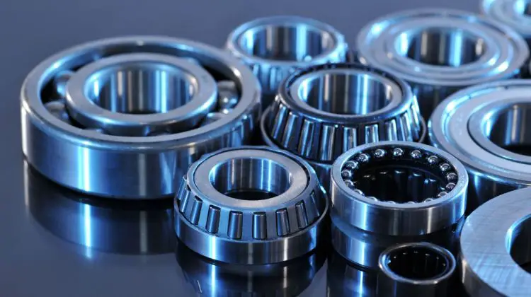 What should wheel bearing seals be checked for